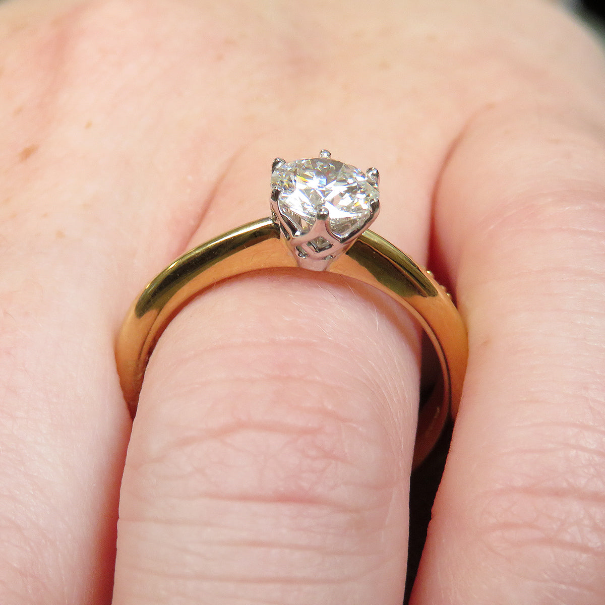 Finishing round cut 0.75ct lab grown diamond solitaire ring made with 18k yellow and white gold