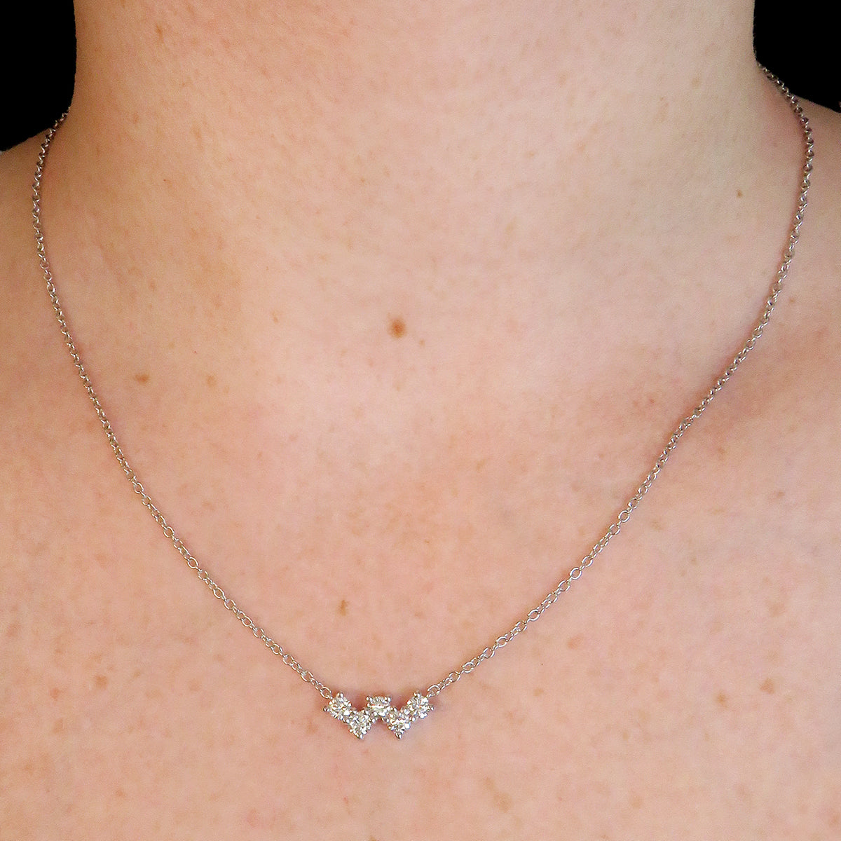 Stunning round cut 0.70ct lab grown diamond V necklace made with 9k white gold