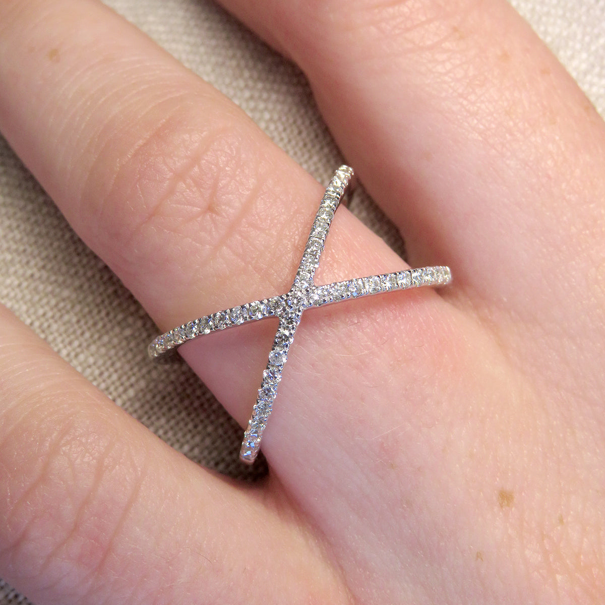 Finishing round cut 0.32ct lab grown diamond Crossover ring made with 9k white gold