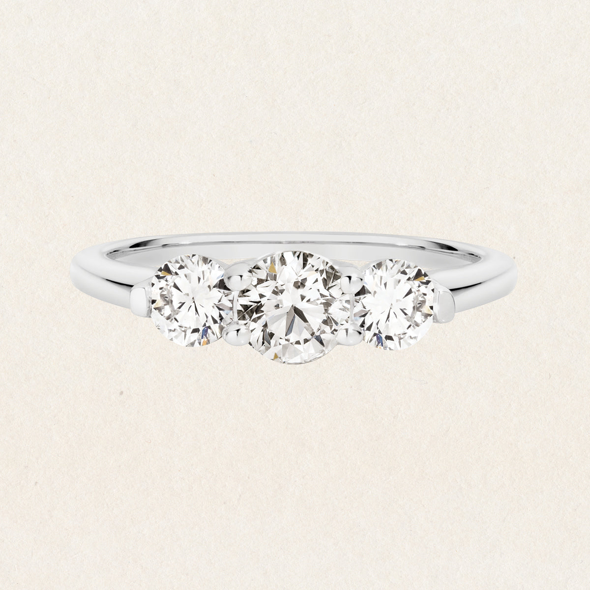 Brilliant round cut 1.03ct lab grown diamond trilogy ring made with 18k white gold