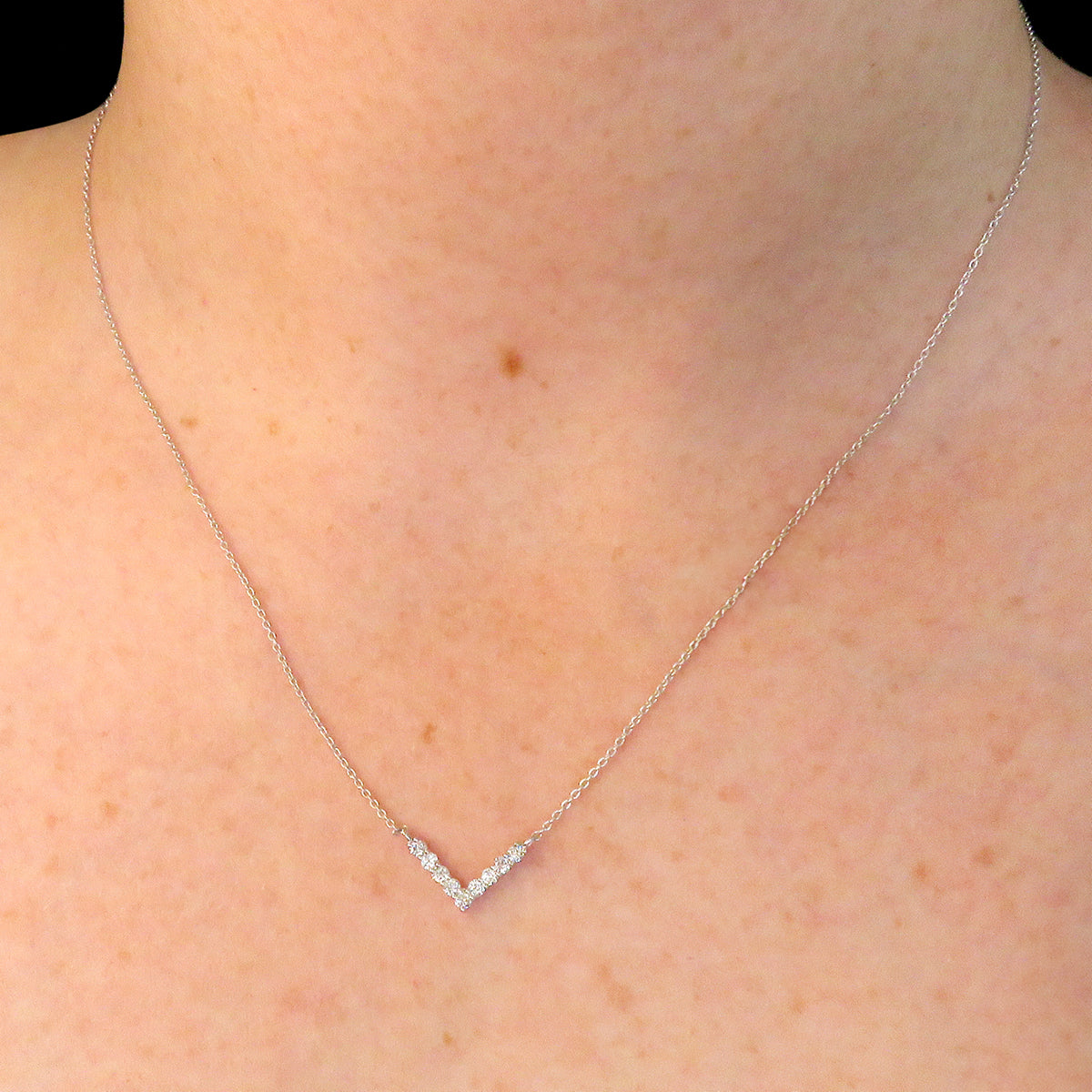Stunning round cut 0.22ct lab grown diamond V necklace made with 9k white gold
