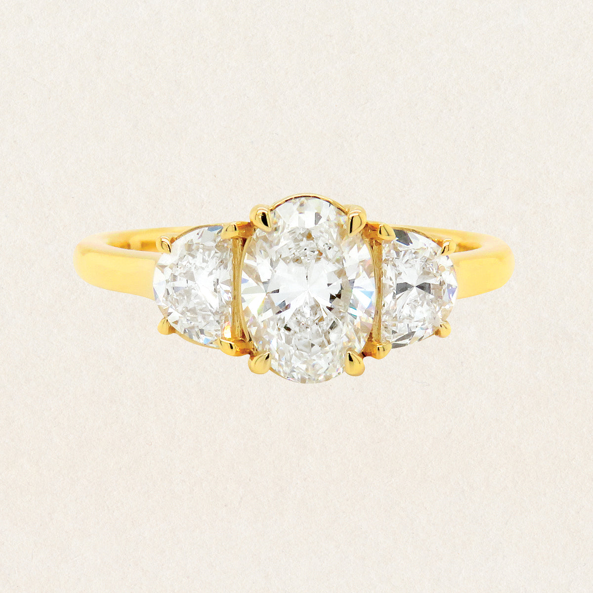 Brilliant oval cut 1.52ct lab grown diamond trilogy ring made with 18k yellow gold