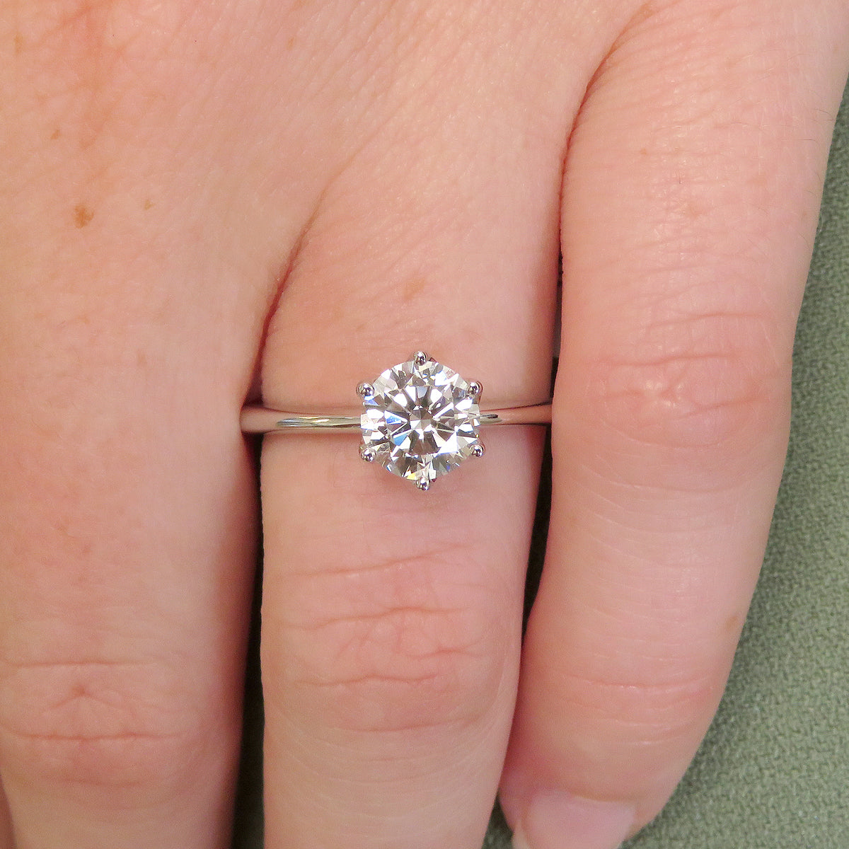 Finishing round cut 1.00ct lab grown diamond solitaire ring made with 18k white gold