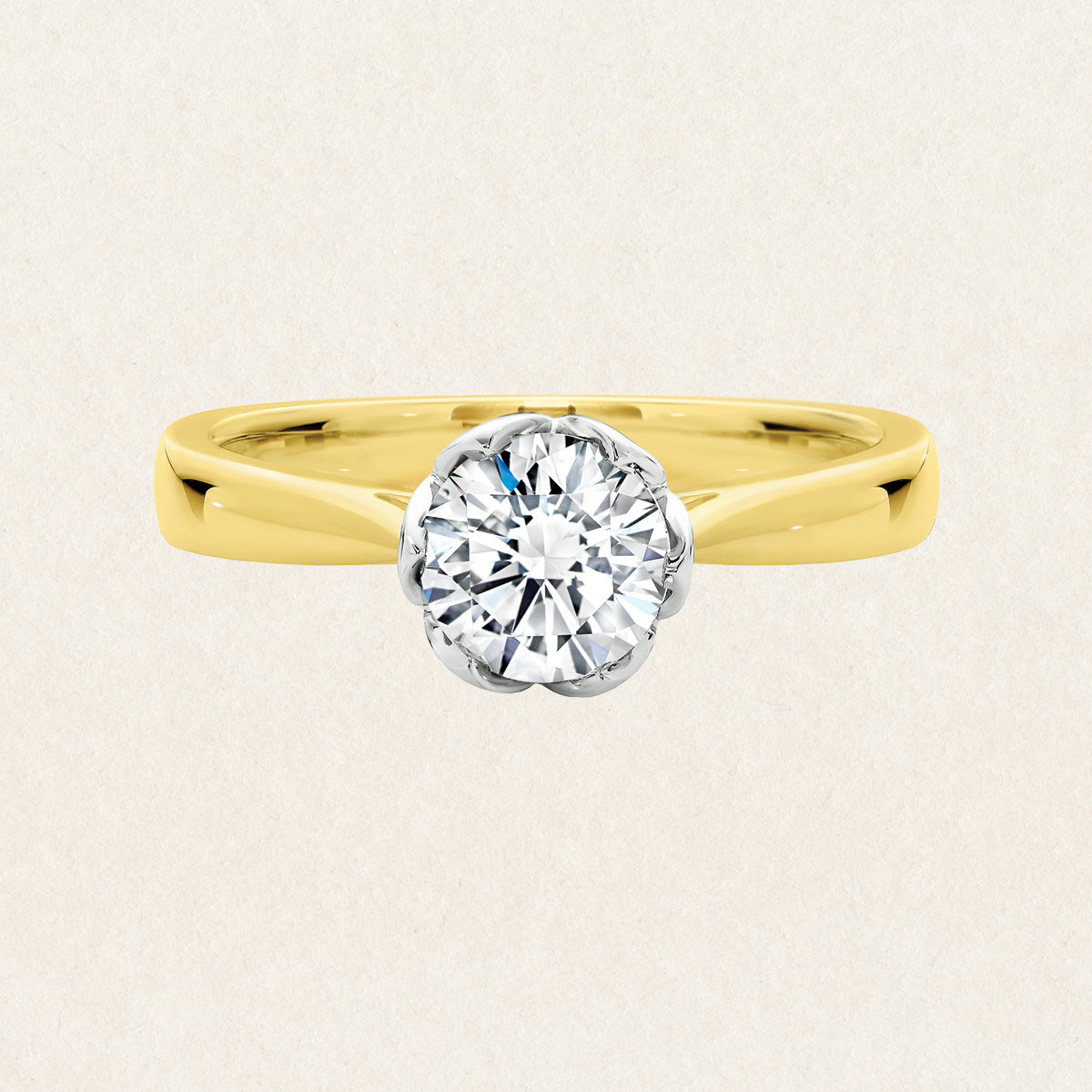 Brilliant round cut 0.73ct lab grown diamond solitaire ring made with 18k yellow and white gold
