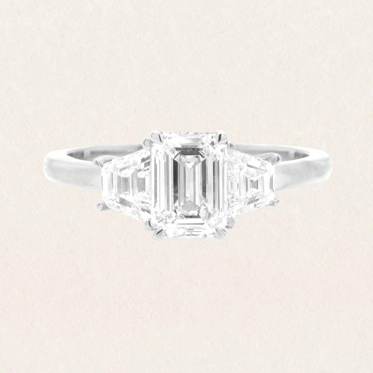 Brilliant emerald cut 0.53ct lab grown diamond trilogy ring made with 18k white gold